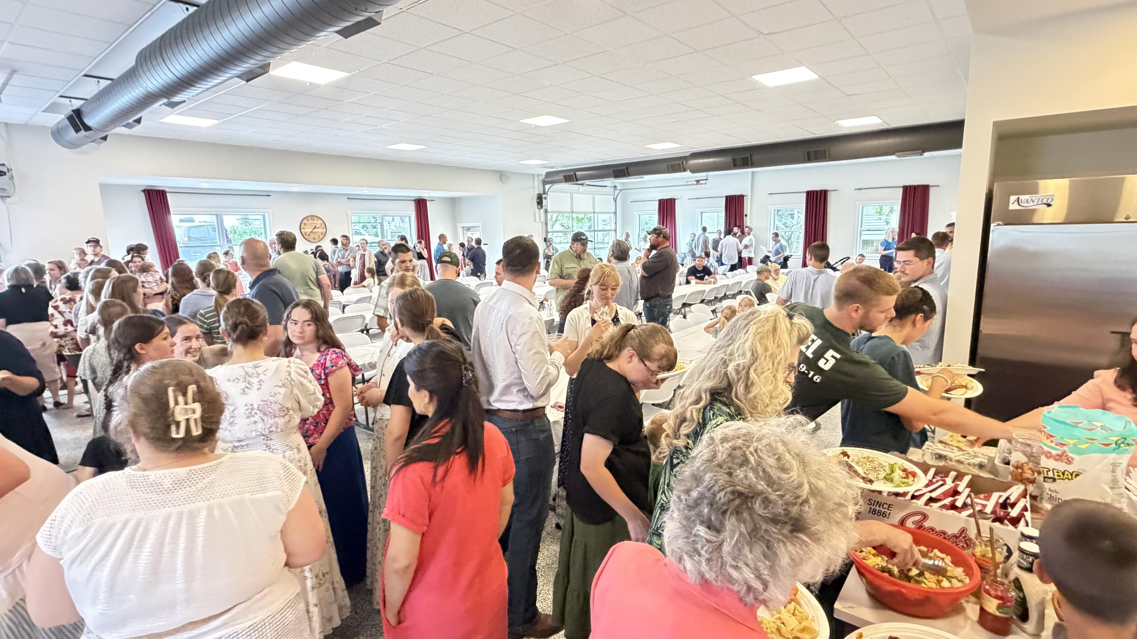 Members and families gathered for a church picnic